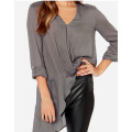Серая шёлковая блузка асимметричного кроя