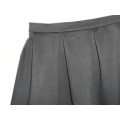 Короткая чёрная юбка с крупными складками