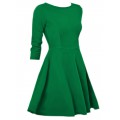 Приталенное зелёное платье с пышной юбкой