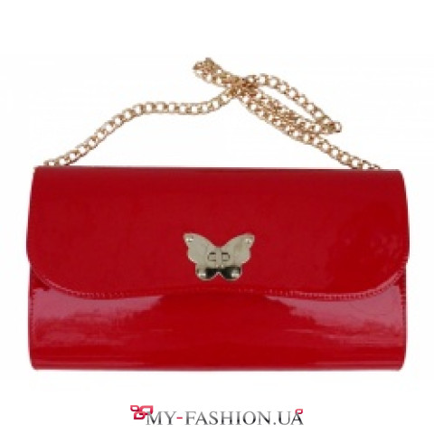 Красный лаковый клатч с застёжкой-бабочкой Красный лаковый клатч с застёжкой-бабочкой