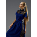 Синее длинное платье с декоративными вставками